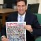 Labour leader Ed Miliband with a copy of The Sun newspaper